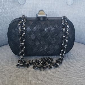 Pour La Victoire black leather woven clutch